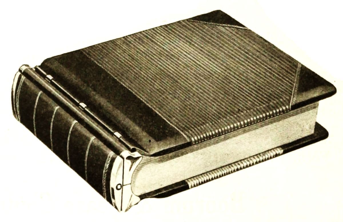 A worn, hardbound accounting ledger.